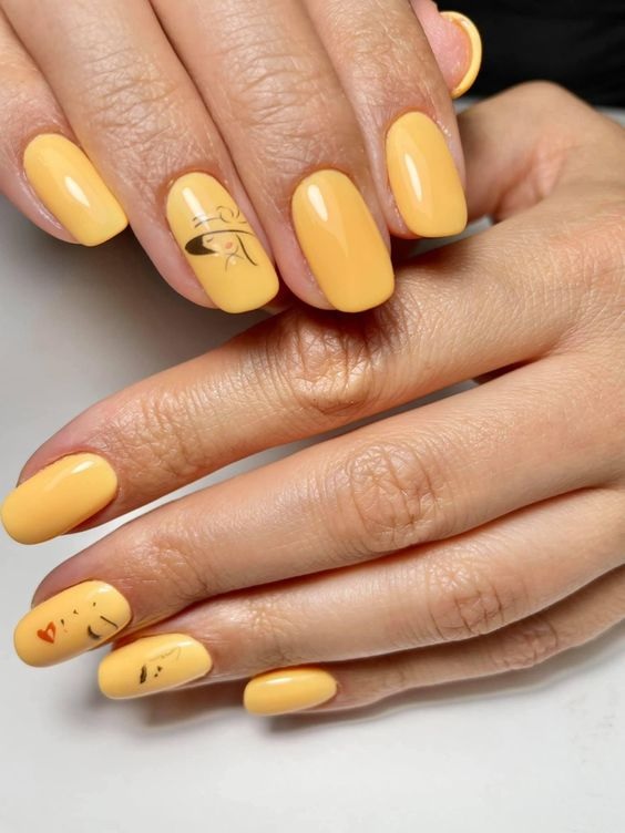 жовтий дизайн нігтів